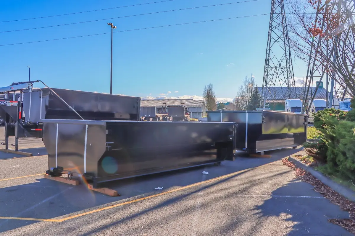 Roll-off dumpster ready for waste disposal at job site for Demolition Dumpster Rental in Perinton